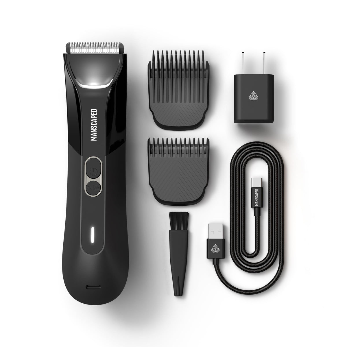 Accessoires de tondeuse MANSCAPED sur une table
