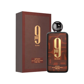 Afnan 9 PM Elixir Eau de Parfum sur une table élégante