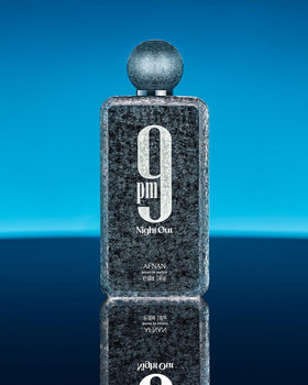 Afnan 9 PM Night Out parfum sur une table élégante