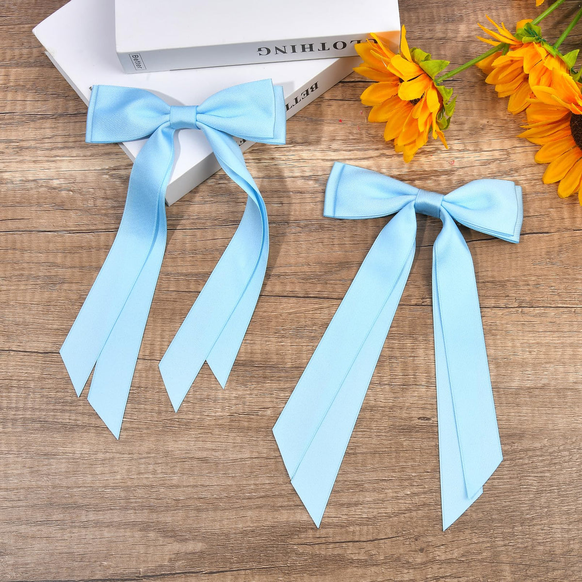 Aileam Bows à Cheveux en Satin en usage sur une coiffure