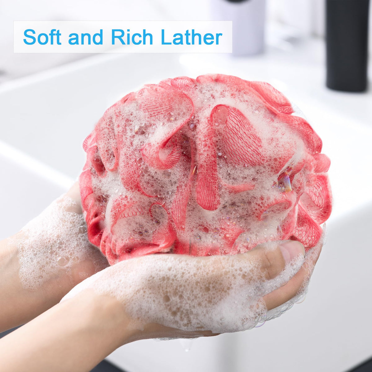 AmazerBath éponge loofah exfoliante en plusieurs couleurs sur fond blanc