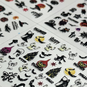 Application d'un autocollant d'ongle Halloween sur un ongle