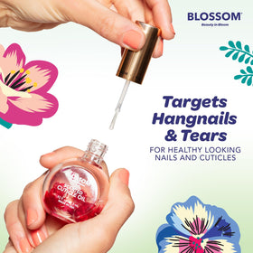 Application de l'huile à cuticules Blossom sur des ongles soignés
