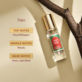 Application de l'huile de parfum ambre sur le poignet