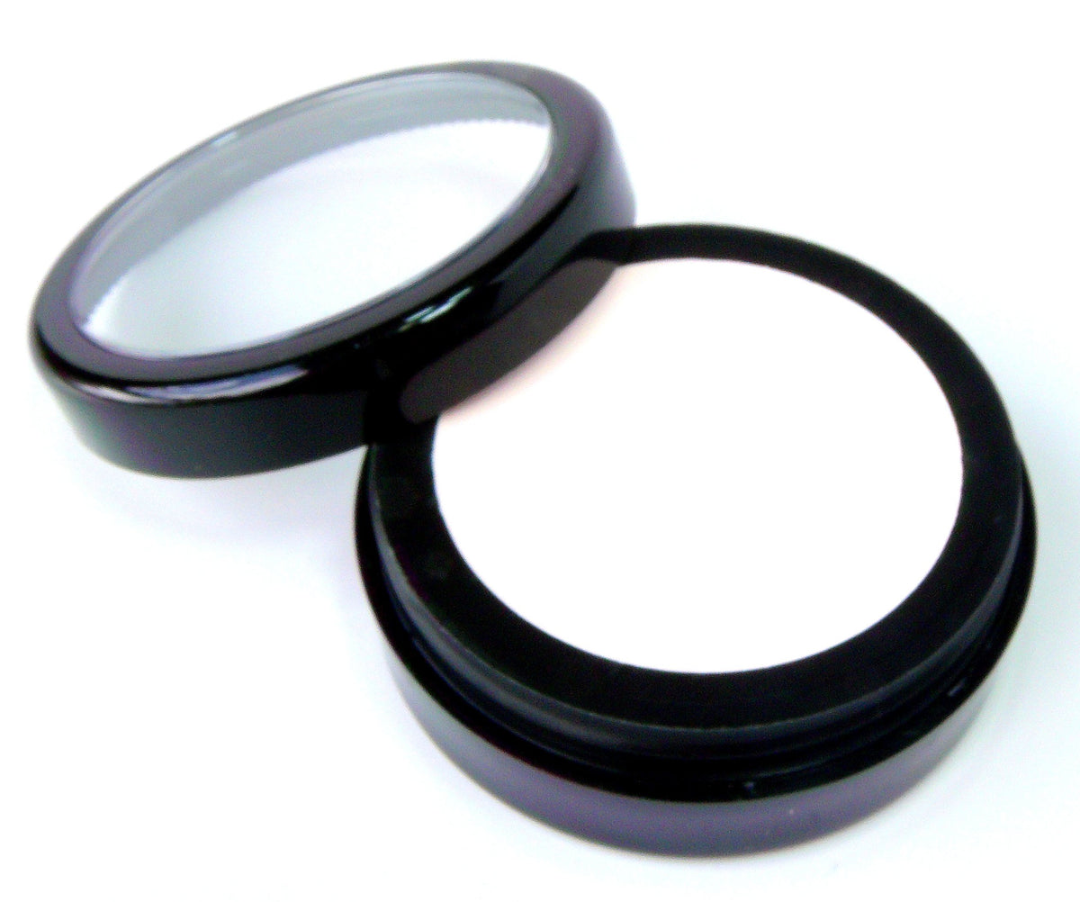 Application de la Base de Maquillage Pigmentée Pure Ziva avec un applicateur