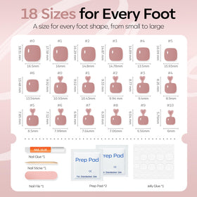 Application des faux ongles de pieds marron rosé sur un pied