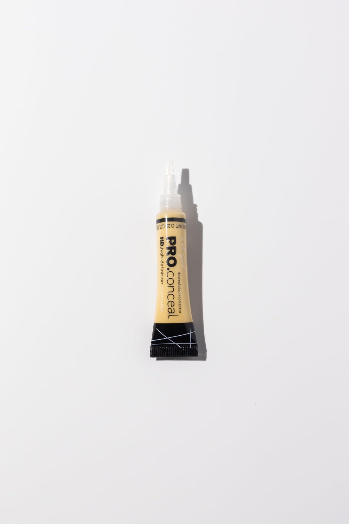 Application du correcteur L.A. Girl sur le visage