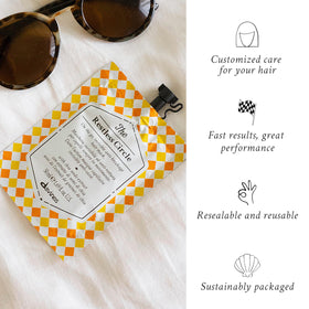 Application du masque capillaire invisible Davines The Restless Circle sur cheveux