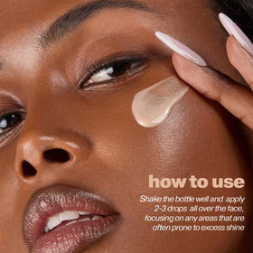 Application du primer ICONIC LONDON sur le visage