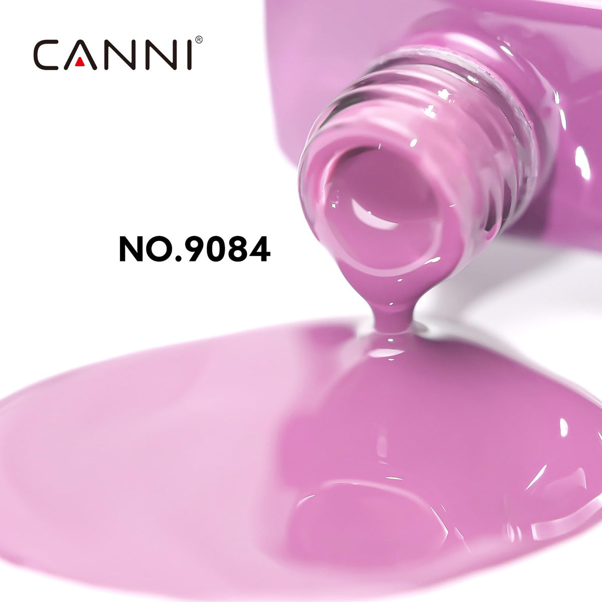 Application du vernis à ongles violet CANNI sur des ongles