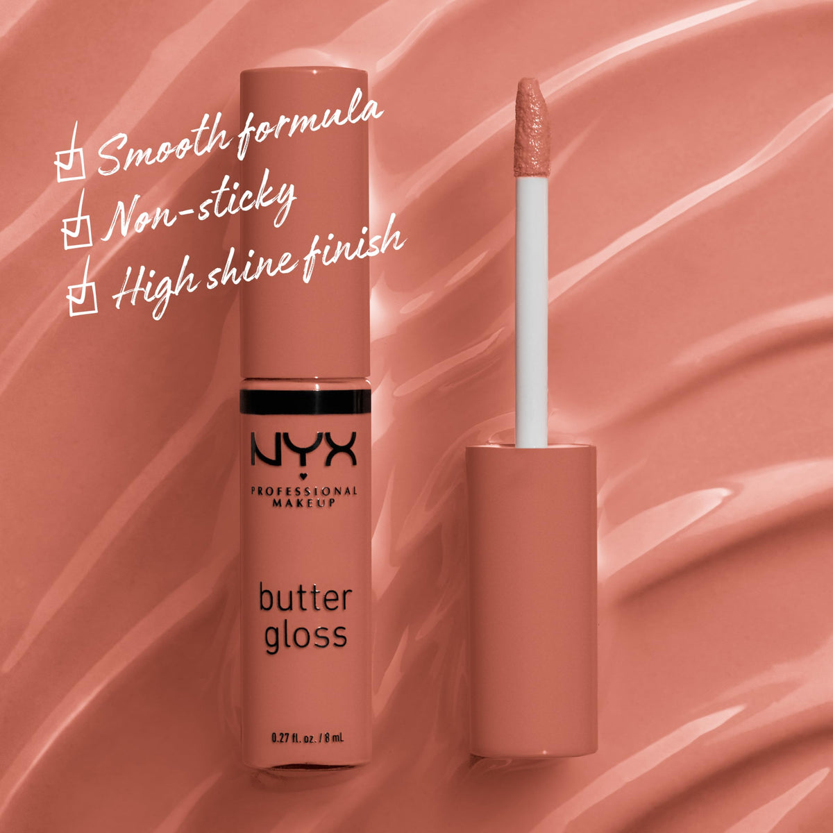 Application of NYX Butter Gloss Brown Sugar on lips