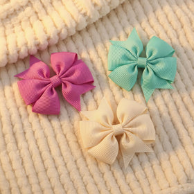 Bandeaux colorés pour bébés Babymatch sur un fond blanc