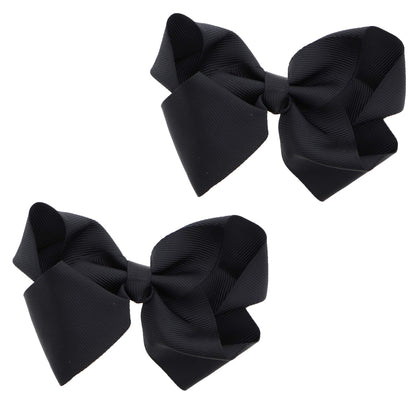 Barrette en grosgrain noire de Motique vue de face avec nœud