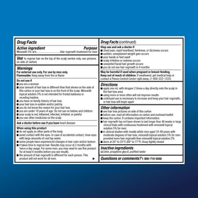 Basic Care Minoxidil 5% usage avec compte-gouttes sur une main