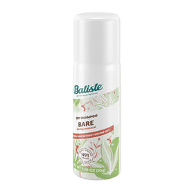 Batiste Shampoo Sec Mini Voyage sur une coiffeuse avec accessoires