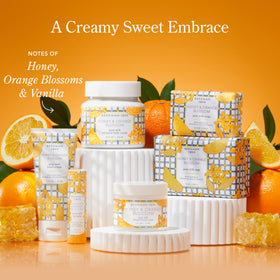 Beekman 1802 Crème Mains Lait de Chèvre 2 oz, présentation avec des fleurs.