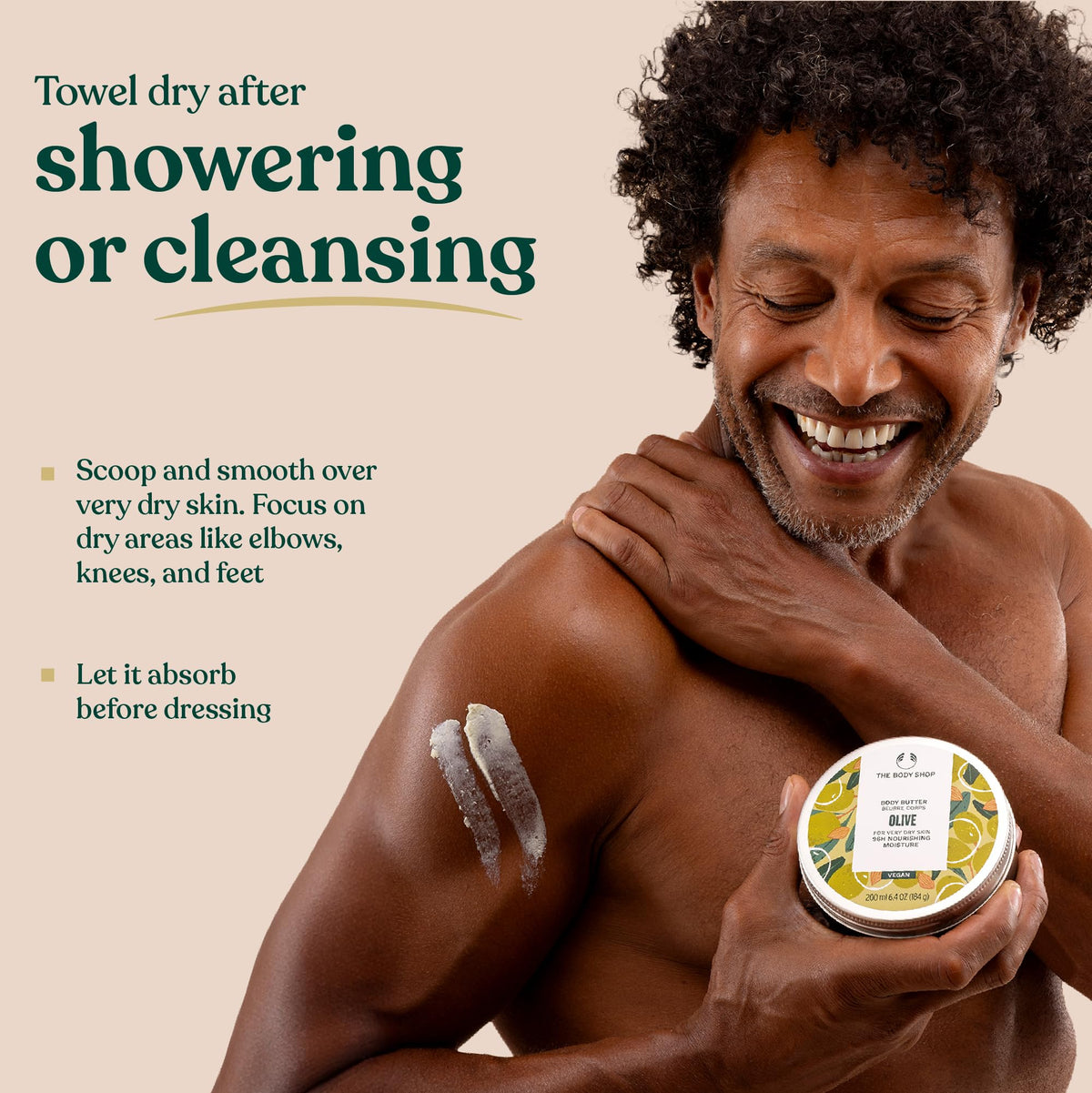 Beurre Corporel Olive The Body Shop sur une surface en bois