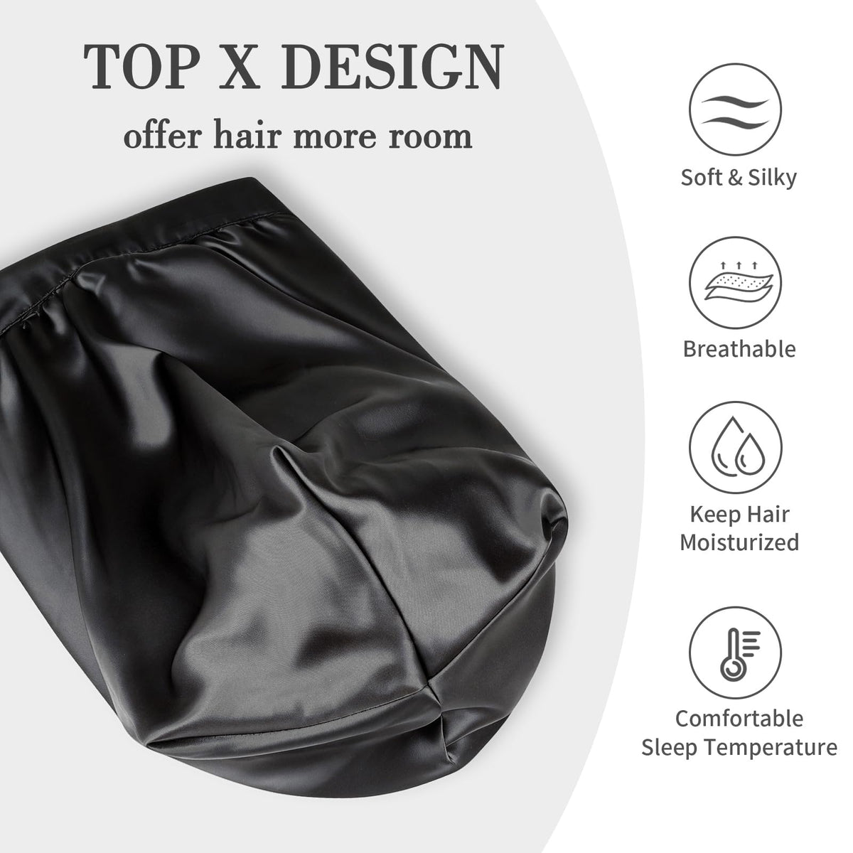 Bonnet long en satin Fittia plié, montrant sa texture douce