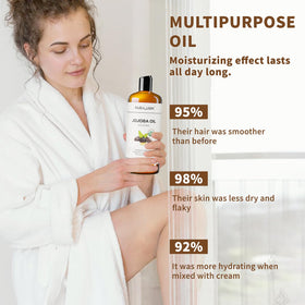Bouteille d'huile de jojoba MAYJAM avec des graines de jojoba en arrière-plan