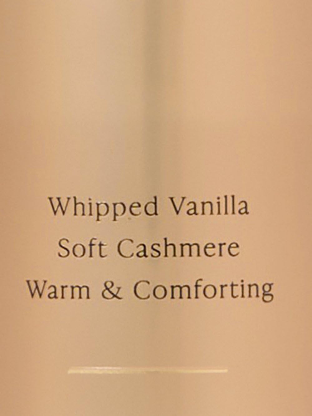 Bouteille de brume Victoria's Secret Bare Vanilla sur une coiffeuse