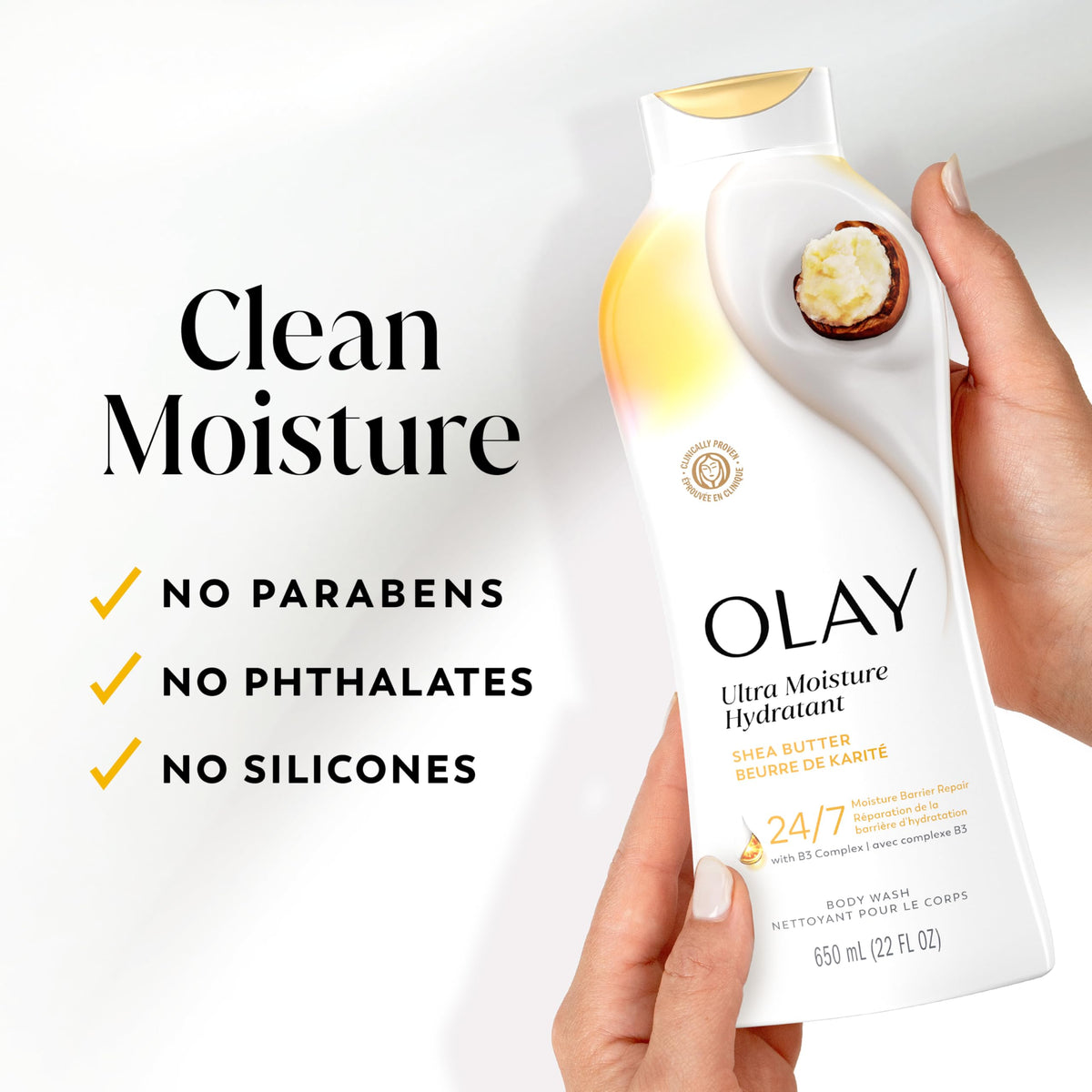Bouteille de gel douche Olay au beurre de karité sur un plan de travail