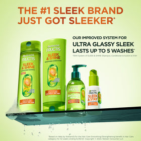 Bouteille de shampooing Garnier Fructis au premier plan, vue de face