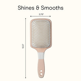 Brosse à cheveux Conair en céramique sur un fond blanc