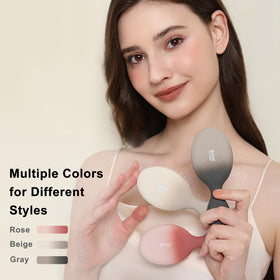 Brosse à cheveux RHOS mini beige gradient sur un fond neutre
