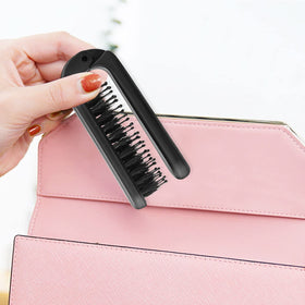 Brosse Ancable utilisée sur des cheveux longs