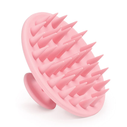 Brosse de massage cuir chevelu Meartchy rose, vue de face avec poils en silicone