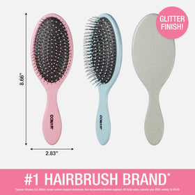 Brosse démêlante Conair utilisée sur des cheveux mouillés
