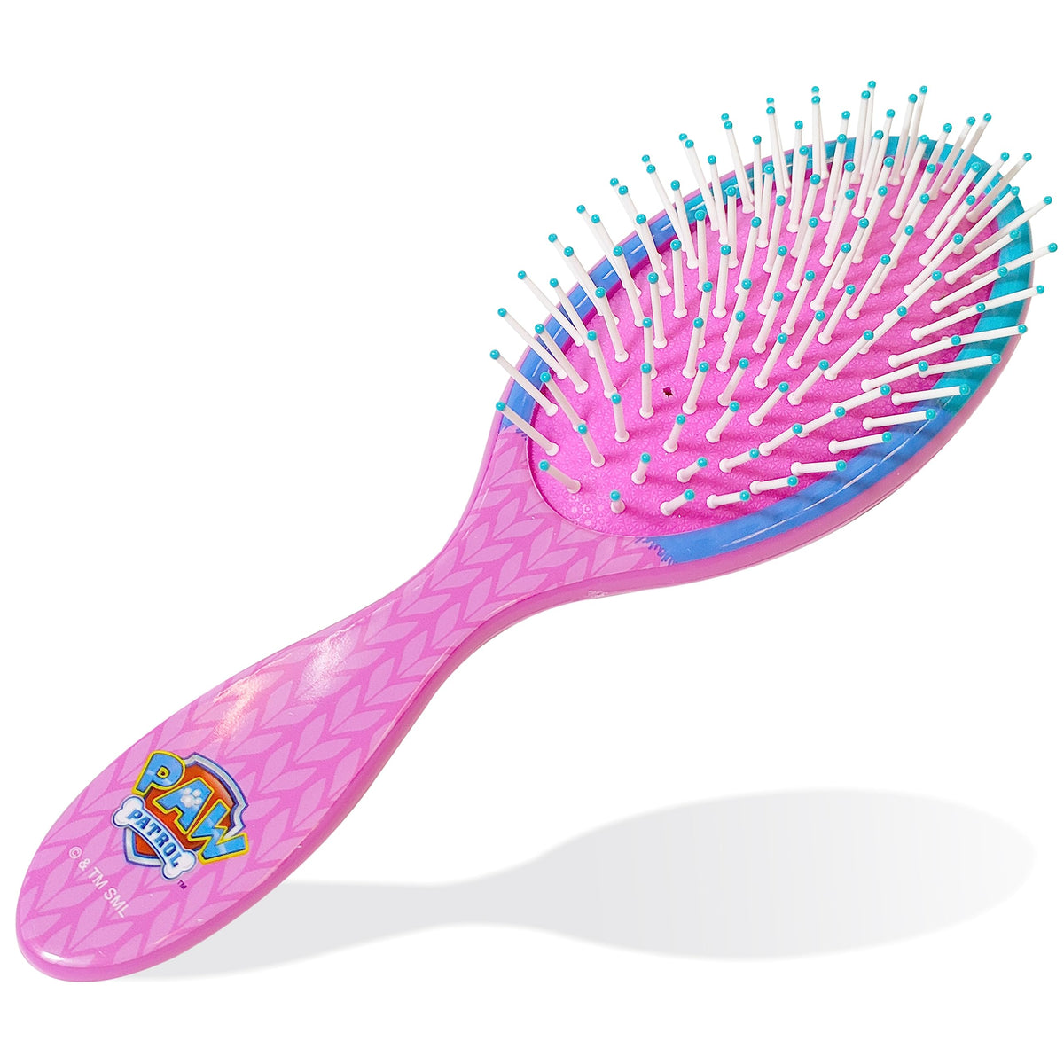 Brosse démêlante LUV HER et chouchous sur fond blanc