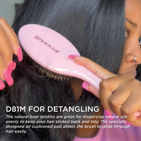 Brosse Denman D81M en rose sur fond blanc