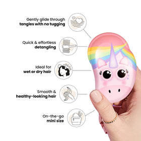 Brosse TANGLE TEEZER Mini dans la main d'un enfant