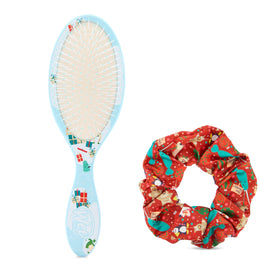 Brosse Wet Brush à côté d'un chouchou noir