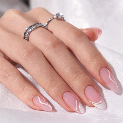 BTArtbox faux ongles blancs marbrés avec pointes roses, présentation de face