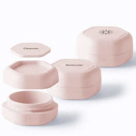Cadence Capsules ensemble de soins avec trois contenants en vue de face