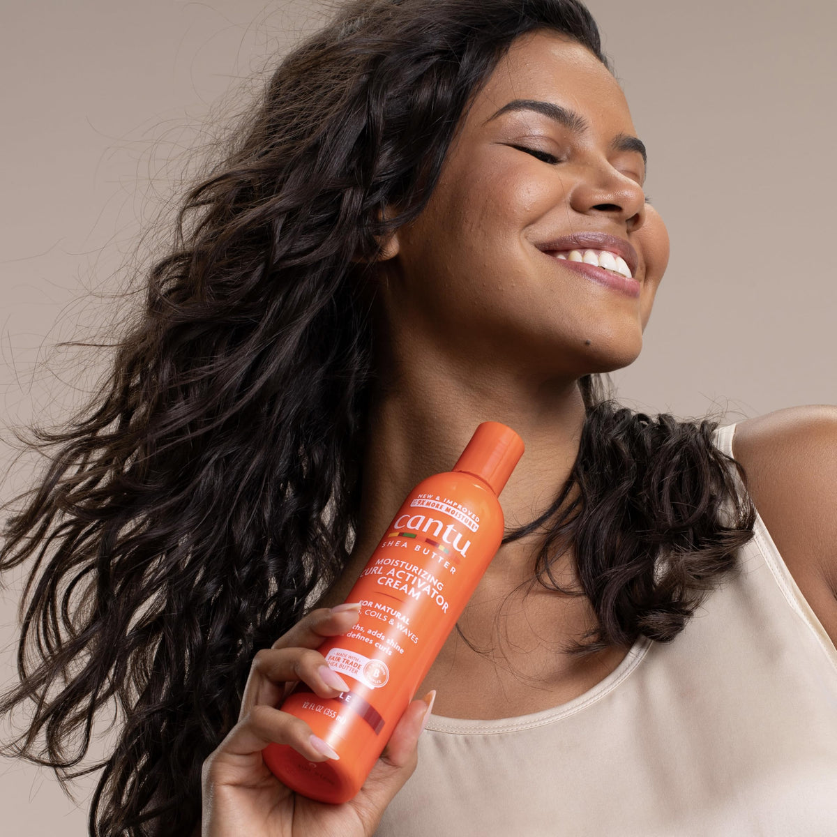 Cantu Crème Activateur de Boucles texture crémeuse