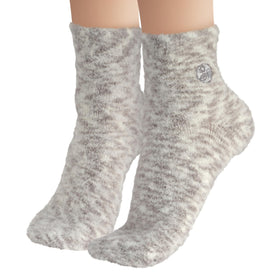 Chaussettes Aloe Vera Earth Therapeutics en gros plan sur l'infusion d'Aloe Vera