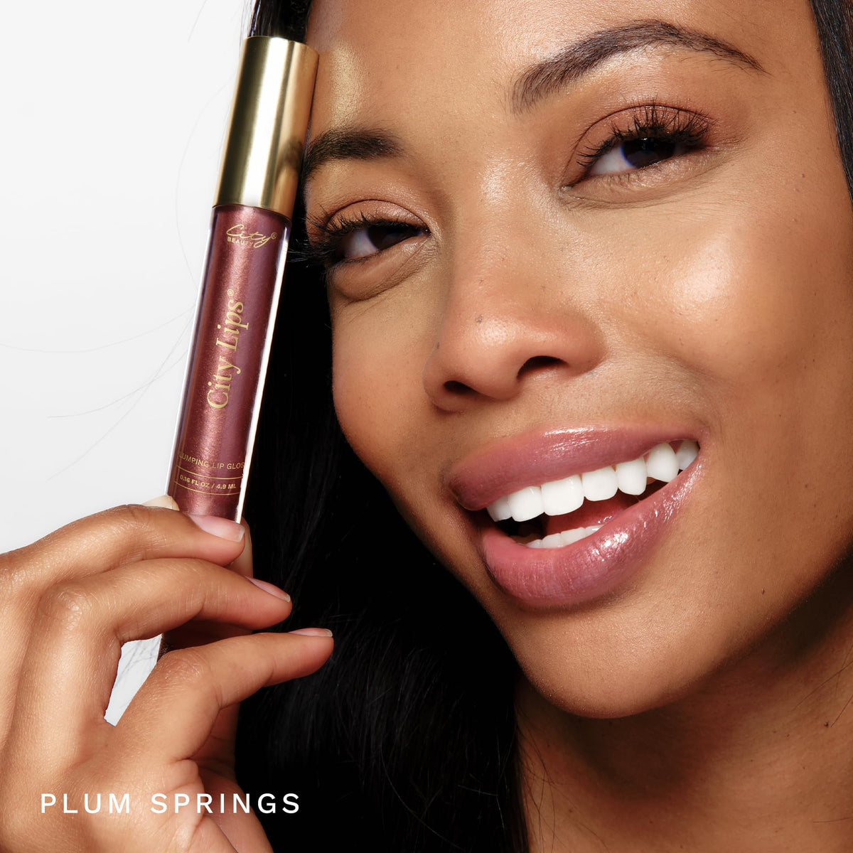 City Beauty Gloss à Lèvres Plum Springs en application