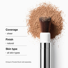 Clinique Poudre Fixante Libre près d'un miroir de maquillage