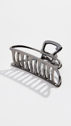 Clip Kitsch ouvert en hématite dans un sac à main