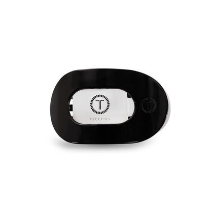 Clip plat rond Teleties couleur noir vue de face