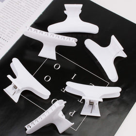 Clips à cheveux Ondder dans un panier d'accessoires de beauté