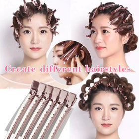 Clips alligator rose Mythos sur cheveux en coiffure