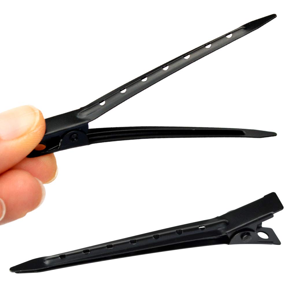 Clips boucle canard Bantoye en usage sur des cheveux lors d'une coiffure