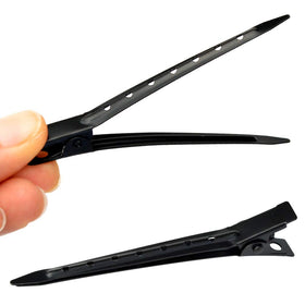 Clips boucle canard Bantoye en usage sur des cheveux lors d'une coiffure