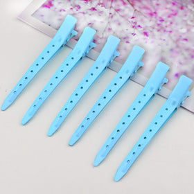 Clips en métal Bantoye utilisés pour coiffer des cheveux