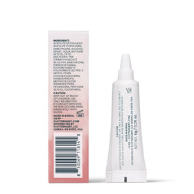 Colle transparente FlutterHabit dans un environnement de maquillage