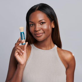 Colorescience Total Protection Brush-On Shield SPF 50 Glow brush applicator close-up